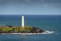 Ninini Point Lighthouse and blue sea and sky at Nawiliwili, Kauai, Hawaii, USA