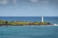 Ninini Point Lighthouse and blue sea and sky at Nawiliwili, Kauai, Hawaii, USA