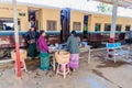 NAWNGHKIO, MYANMAR - NOVEMBER 30, 2016: Food vendors on the train station in Nawnghkio Naunghkio, Naungcho or Nawngcho near