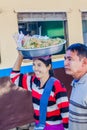 NAWNGHKIO, MYANMAR - NOVEMBER 30, 2016: Snack vendor on the train station in Nawnghkio Naunghkio, Naungcho or Nawngcho near