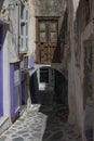 Small alley in Naxos Chora, with an arched tunner Royalty Free Stock Photo