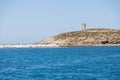 Naxos island sacred Temple of Apollo Cyclades Greece. Cafe at seaside calm sea blue sky Royalty Free Stock Photo