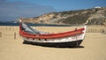 Nazare lifeboat in a beach exhibit by the Dr. Joaquim Monso Museum in collaboration with the Municipality of Nazare, Portugal.
