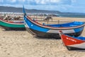 Detailed view of colored and traditional fishing boats on the Nazare beach