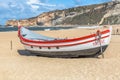 Detailed view of colored and traditional fishing boats on the Nazare beach