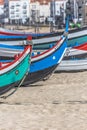 Detailed view of colored and traditional fishing boats on the Nazare beach