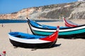 Nazare, Portugal - November 5, 2017: colorful traditional old wooden fishing boat on the beach of fishing village of Nazare . Royalty Free Stock Photo