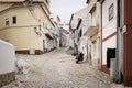 Nazare Sitio, Portugal - July 19 2019: Rua Amadeu Gaudencio, a typical rustic Portuguese street