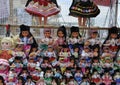 Nazare, 20th July: Stand with dolls in traditional multicolored clothes in Sitio da Nazare Square from Nazare in Portugal