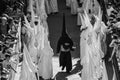 Nazarenes are leading an Easter procession in southern Spain