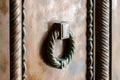 Bronze decorative handle on the entrance door to the catholic Christian Transfiguration Church located on Mount Tavor near