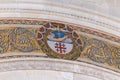 Decorative mosaic coat of arms on the wall in the catholic Christian Transfiguration Church located on Mount Tavor near Nazareth