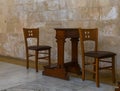 Prayer table and chairs in the side prayer room in the catholic Christian Transfiguration Church located on Mount Tavor near