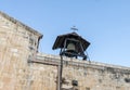 Bell tower on the main facade of Greek Orthodox Church of the Annunciation decorated for Christmas in Nazareth city in Israel Royalty Free Stock Photo