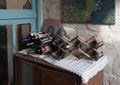 Bottles with wine in a decorative stand in Michel House in the old city of Nazareth in Israel