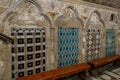 Wooden benches in the lower hall of the Greek Orthodox Church of the Annunciation in Nazareth old city in northern Israel Royalty Free Stock Photo