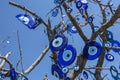 Nazars hang from a tree at Pigeon Valley at Uchisar in Turkey.