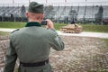 Nazi soldier and WW II Italian tank at Militalia 2013 in Milan, Italy