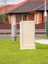 NBN fiber cabinet besides old copper telephone cable pillar