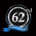 62nd anniversary logo with silver ring and blue ribbon