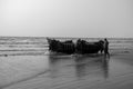 2nd February, 2022, Mandarmani, East Midnapur, West Bengal, India: A wooden lonely fishing boat with few fishermen on Digha sea