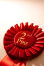 2nd place winners rosette or badge in red