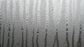 Ndensation droplets are scattered across a translucent surface forming Royalty Free Stock Photo