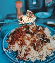 ndian food: Madras beef with basmati rice and salad on the table. horizontal view from above