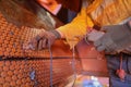 NDT inspector technician wearing safety glove protection standing holding UT thickness testing device Royalty Free Stock Photo