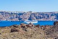 Nea Kameni volcanic landscape and cruise ships in the Caldera Santorini island Greece Royalty Free Stock Photo