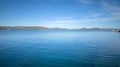 Nea Makri Greece. Panoramic view of vast Aegean calm sea background. Destination for vacation Royalty Free Stock Photo