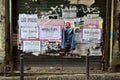 Neapolitan funeral notices posted on a lock up in a street, Naples 