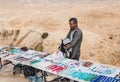 Bedouin - the seller of handmade decorative ornaments and memorable souvenirs on the viewing platform near Mitzpe Yeriho in Israel