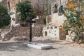 A large wooden cross near the grave in the cemetery in the monastery of St. George Hosevit Mar Jaris near Mitzpe Yeriho in Israe Royalty Free Stock Photo