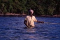 Near Port Blair, Andaman Islands, India, circa October 2002: Fisherman pulling the fishnet from the ocean.