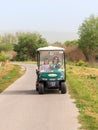 Visitors drive along an electric vehicle path in the Hula Lake Nature Reserve near the Yesod HaMa`ala settlement in Israel Royalty Free Stock Photo
