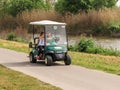 Visitors drive along an electric vehicle path in the Hula Lake Nature Reserve near the Yesod HaMa`ala settlement in Israel