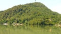 Near Zvornik, Drina river with mountains and trees and blue sky in one summer day. Panoramic view, landscape, boat