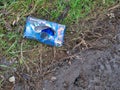 A nearly empty box of PPE nitrile gloves discarded thoughtlessly at the side of a country lane
