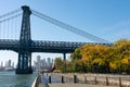 Walkway along the East River Park by the Williamsburg Bridge on the Lower East Side of New York City during Autumn