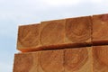 Neat coniferous timber in stacks to ship