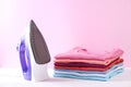 Composition with folded clothes, unisex for both man and woman, different color & material. Pile of laundry, dry clean clothing Royalty Free Stock Photo