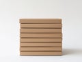 Stack of Brown Books or Boxes on White Background, Minimalist Composition. Royalty Free Stock Photo