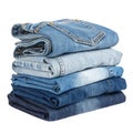 A neat stack of folded blue denim jeans in various shades, isolated on white background Royalty Free Stock Photo