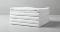 Stack of Clean White Folded Towels on a Light Gray Surface Royalty Free Stock Photo