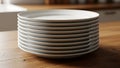 Stack of White Plates on Wooden Table Royalty Free Stock Photo