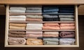 Neat and tidy sock drawer with folded socks of various colors Creating using generative AI tools