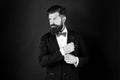 Neat and tidy. Stylist fashion expert. Suit style. Fashion trends for groom. Groom bearded hipster man wear tuxedo and