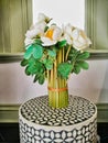 Neat White Flower Arrangement on Round Table