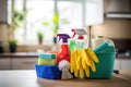 Neatly Arranged Cleaning Tools and Equipment on Wooden Table - Household Chores and Tidying Up Concept